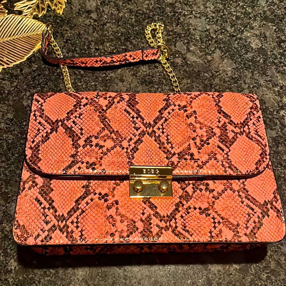 I am selling a pink and black BCBG bag